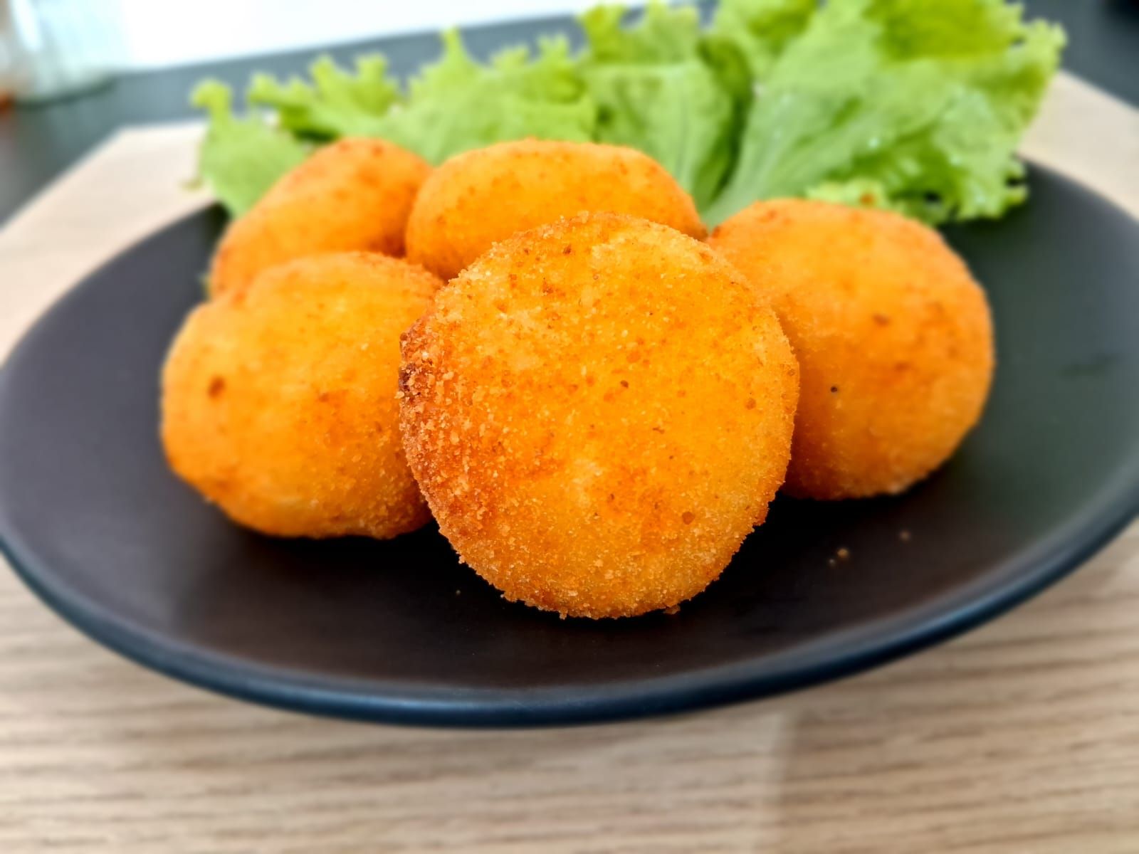 PORÇÃO DE BOLINHA DE COALHADA